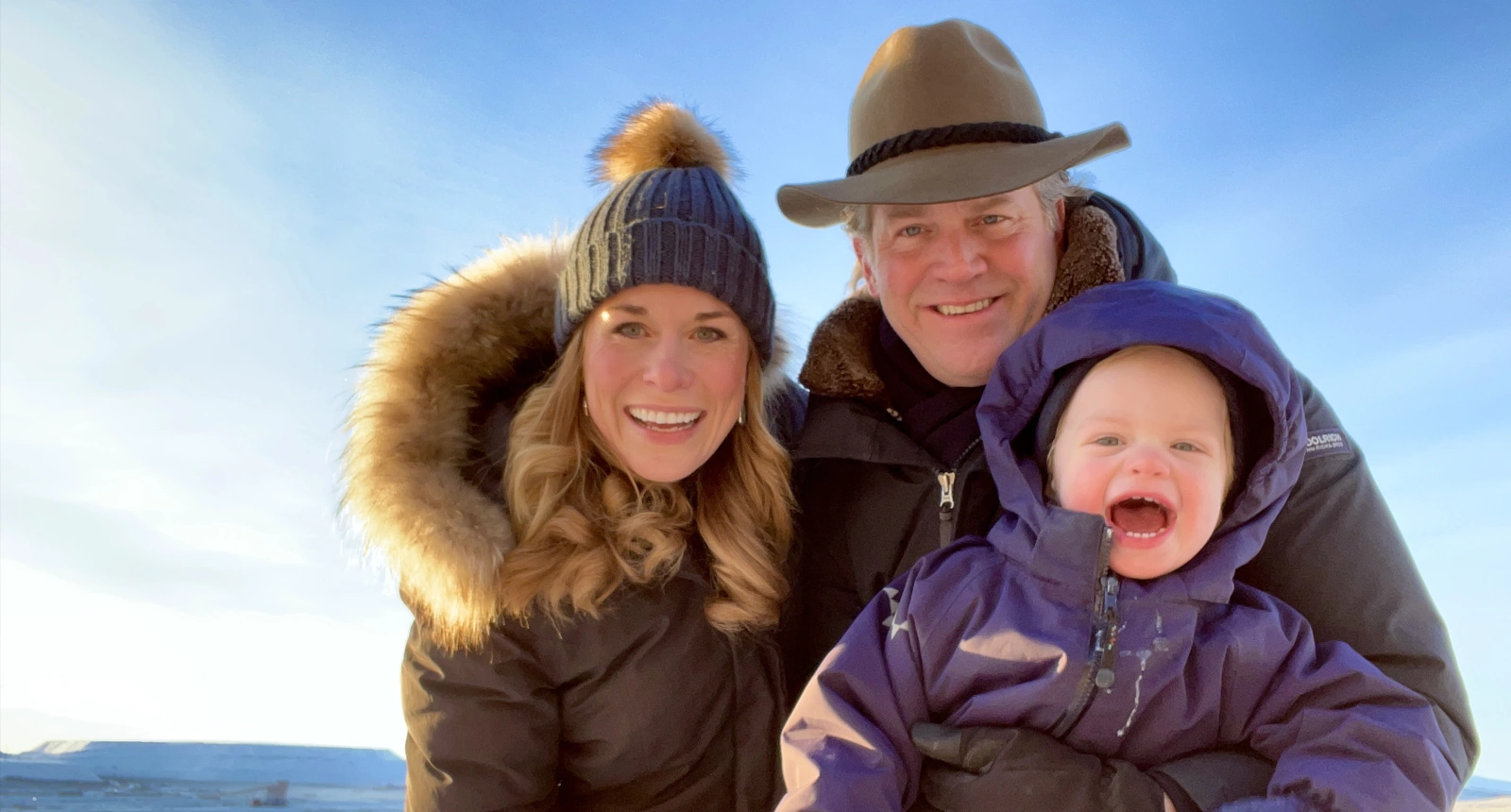Nina, Francisco, and Tomás – founders of ÁILU Hotel, standing together in the Arctic nature of Lannavaara, Swedish Lapland